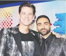  ?? RACHEL MURRAY/GETTY IMAGES ?? Actor Lee Majdoub, right, plays the assistant to Jim Carrey’s villain in Sonic the Hedgehog. Majdoub’s audience of admirers is now hoping to see the Lebanese-born Canadian in a sequel.