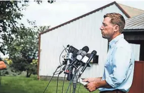  ?? BRIAN POWERS/THE DES MOINES REGISTER ?? Dane Lang, co-owner of Yarrabee Farms, speaks to the media on his family's farm Aug. 22 in Brooklyn, Iowa. Cristhian Rivera, a former employee at the farm, has been charged with the murder of Mollie Tibbetts.