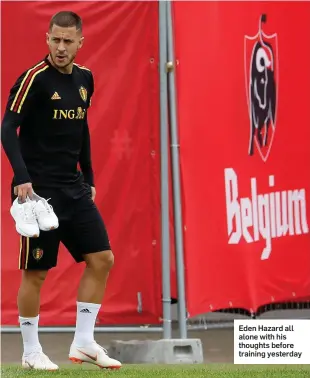  ??  ?? Eden Hazard all alone with his thoughts before training yesterday