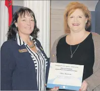  ?? SUBMITTED PHOTO ?? Olive Beairsto (right) of Summerside was presented with the Eileen Fulford Memorial Award at the Canadian Cancer Society’s annual volunteer and donor awards ceremony by Marlene Mulligan, executive director, Canadian Cancer Society, P.E.I.