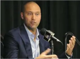  ?? THE ASSOCIATED PRESS ?? Miami Marlins part owner Derek Jeter speaks during a press conference in Miami. Jeter is trying to revive a moribund Marlins franchise, and so far the former Yankees captain appears out of his league as a CEO.