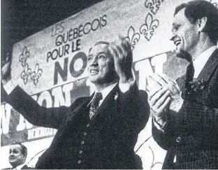  ?? MONTREAL GAZETTE FILES ?? Introduced by then-justice minister Jean Chrétien, right, Pierre Elliott Trudeau galvanized supporters at Montreal’s Paul Sauvé Arena on May 14, 1980, when he celebrated a sense of being both Québécois and Canadian.