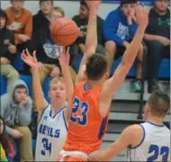  ??  ?? Camden senior guard John Plumley launches a 3-point shot during the second half of Tuesday’s Tri-Valley League meeting with Oneida.