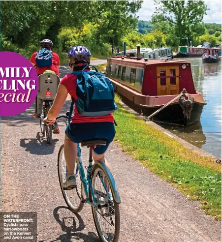  ??  ?? Cyclists pass narrowboat­s on the Kennet and Avon canal