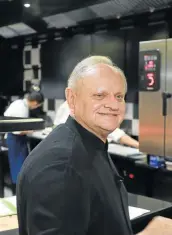  ?? Pictures: AFP ?? MICHELIN MAN: Joël Robuchon in the kitchen of La Grande Maison in Bordeaux