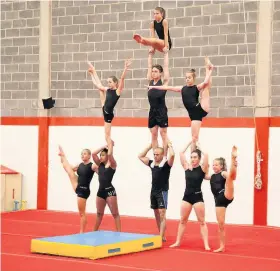  ??  ?? Gymnasts perform a special display at the official opening of Loughborou­gh Acrobatics Gymnastic Club’s new extended HQ.