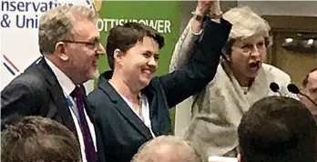  ??  ?? Show of strength: Theresa May and Ruth Davidson yesterday, with David Mundell