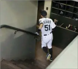  ?? TED S. WARREN — THE ASSOCIATED PRESS ?? Seattle’s Ichiro Suzuki walks down the dugout steps at the start of Thursday’s game against the Athletics in Seattle. Suzuki was released that day by the Mariners and is shifting into a front office role with the team, so he cannot be in the dugout...