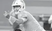  ?? BRYNN ANDERSON/AP ?? Dolphins quarterbac­k Josh Rosen calls a play during a preseason game against the Atlanta Falcons on Aug. 8.