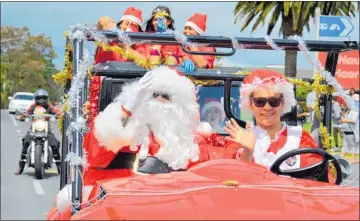  ?? Photo / Debbie Beadle ?? Santa and Mrs Claus drove a sideby-side in Kaikohe’s 2017 parade but this year they plan a far grander entrance.