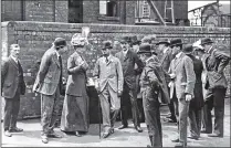  ?? PICTURES: LEEDS LIBRARIES / PETER TUFFREY COLLECTION ?? EXPECTANT ASSEMBLY: Main picture, King George V and Queen Mary will always be remembered in Leeds for their visit to open the Civic Hall on August 23, 1933; above from left, arrival of Prince of Wales in the city of Ripon, 1905; The Prince of Wales leaving Sheffield University on his visit in 1909; the Royal visit to Sheffield Weston Park, 1909; King George V and Queen Mary visiting Silverwood colliery in July 1912.