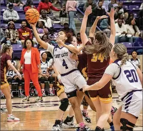  ?? Southern Sass/Special to News-Times ?? Lean back: El Dorado's Lindsey Lockhart leans in for a lay-up against Lake Hamilton. The Lady Wildcats won 63-56 Friday at Wildcat Arena.