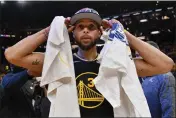  ?? JOSE CARLOS FAJARDO — BAY AREA NEWS GROUP ?? The Golden State Warriors’ Stephen Curry walks on the court after winning the Western Conference Finals at the Chase Center in San Francisco on Thursday.