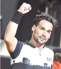  ??  ?? Italy’s Fabio Fognini celebrates after winning the match against France’s Jo-Wilfried Tsonga during their ATP Masters tournament tennis match at the Foro Italico in Rome, on May 13, 2019. — AFP photo