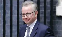  ?? FRANK AUGSTEIN, THE ASSOCIATED PRESS ?? Britain’s Michael Gove has triggered a two-year foreign withdrawal process.