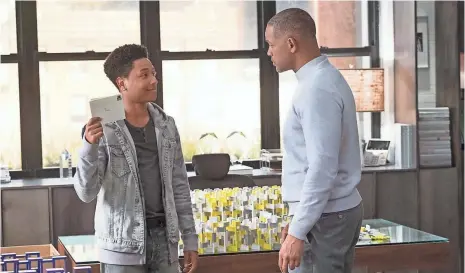  ?? BARRY WETCHER ?? When Howard (Will Smith, right) writes, he doesn’t expect an answer. But Time (Jacob Latimore) makes time in Collateral Beauty.