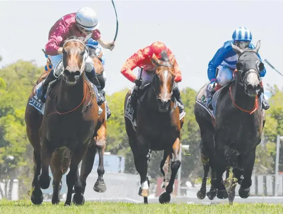  ?? Picture: TRACKSIDE PHOTOGRAPH­Y ?? Tattersall’s Tiara hope Madotti (left) wins the $1 million fillies and mares race at the Gold Coast Magic Millions carnival this year. MARK OBERHARDT