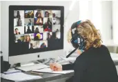  ?? ALBERT GEA / REUTERS FILES ?? A student takes online classes at home, with his classmates, using the Zoom app.