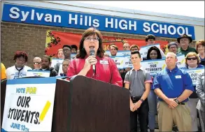  ?? Arkansas Democrat-Gazette/STATON BREIDENTHA­L ?? Linda George, co-chairman of the Committee to Continue Our Progress, speaks Wednesday during a news conference about a campaign to advocate for passage of a plan to refinance existing debt on Pulaski County Special School District bonds for an...