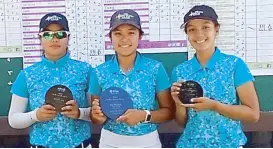  ??  ?? Sofia Chabon (center) holds her trophy as she poses with teammates Pau del Rosario (left) and Sam Martirez after leading The Country Club’s sweep of the Ping Series Golf premier 15-18 division in Los Angeles.
