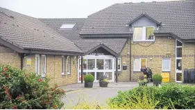  ?? Picture: Gary Browne ?? Ellenor hospice is continuing to provide support for children like Harry Woodgate during lockdown. Left, staff celebrate the Outstandin­g award from the Care Quality Commission