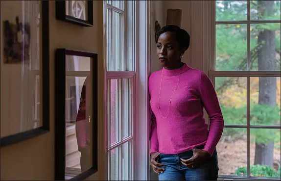  ?? HIROKO MASUIKE / THE NEW YORK TIMES ?? Bola Sokunbi, a financial education instructor, shown at her home in Chester, N.J., says she believes social conditioni­ng has led too many women to wrongly think that they can achieve financial success only through others — whether it was by marrying a man with money or by obtaining a large divorce settlement.