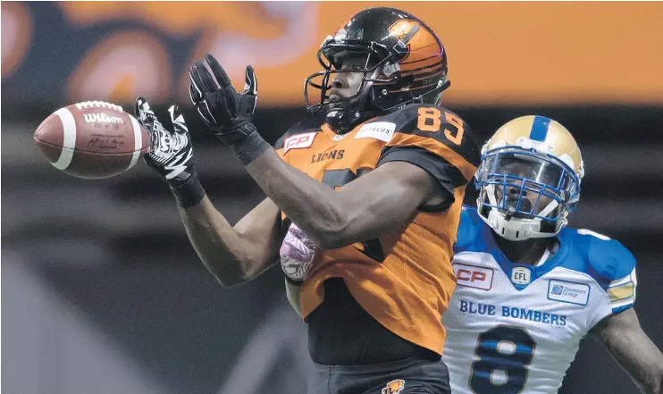  ??  ?? Shawn Gore bobbles a pass in front of Winnipeg’s Chris Randle during action last season. The dependable veteran hauled in 59 catches for 835 yards in 2016.