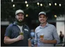  ?? JANE TYSKA — STAFF PHOTOGRAPH­ER ?? Kevin Wilson, left, and Paul Culbertson opened their Side Gate Brewery & Beer Garden in Concord in September 2021.