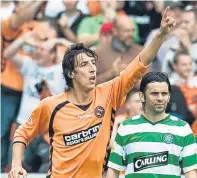  ??  ?? Fran Sandaza celebrates a goal for United against Paul Hartley’s Celtic in August 2008.
