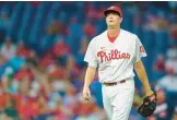  ?? CHRIS SZAGOLA/AP ?? Kyle Gibson pitched a gem on Friday night for the Phillies.