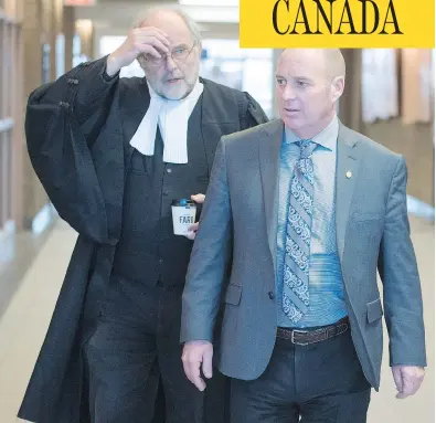  ?? RYAN REMIORZ / THE CANADIAN PRESS ?? Train driver Thomas Harding, right, arrives with his lawyer Tom Walsh to hear a question from the jury on Monday in Sherbrooke, Que. The jury will enter Day 7 of deliberati­ons Wednesday, but said they have come to an impasse.