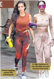  ??  ?? Printed leggings paired with matching tee
In Gigi Hadid set of one‐shoulder bra and slouchy track pants