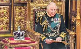  ?? ?? Prince Charles delivered the Queen’s Speech with the Queen’s crown by his side.