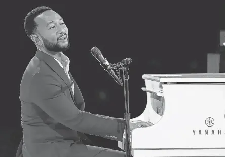  ?? CHRIS PIZZELLO/ INVISION/ AP ?? John Legend performs at MusiCares Person of the Year honoring Berry Gordy and Smokey Robinson at the Los Angeles Convention Center on Feb. 3. His hit, “All of Me,” makes our love- song list.