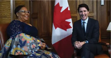  ?? SEAN KILPATRICK/THE CANADIAN PRESS ?? Prime Minister Justin Trudeau shares a chuckle with Nobel peace laureate Leymah Gbowee in his office on Parliament Hill.