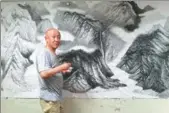  ?? PROVIDED TO CHINA DAILY ?? Ma Xiaotian works on his ink creation in his Beijing studio.