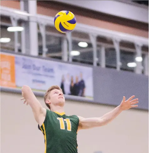  ?? ARTHUR IMAGES ?? Michael Corrigan, shown in action during the 2017-18 Canada West season, is the final captain in the history of the University of Regina Cougars men’s volleyball program. The school has eliminated three teams, including men’s volleyball, in a bid to...