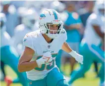  ?? JULIO CORTEZ/AP ?? Dolphins wide receiver River Cracraft works out prior to last week’s game against the Ravens in Baltimore.