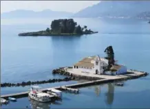  ?? PHOTO BY SANDRA NOWLAN ?? Mouse Island and the Vlacherna Monastery on the Greek island of Corfu.