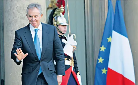  ??  ?? Tony Blair leaving the Elysee Palace on October 11, 2010, after a meeting with President Nicolas Sarkozy while Jack Straw, below, meets Ukraine PM Mykola Azarov in 2011 in Kiev