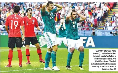  ??  ?? GERMANY’s forward Mario Gomez (L) and defender Mats Hummels react after failing to score during the Russia 2018 World Cup Group F football match between South Korea and Germany at the Kazan Arena in Kazan on June 27.