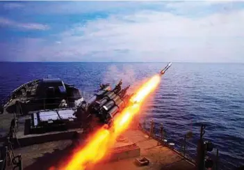  ?? PHOTOGRAPH­S: Indian Navy ?? (Left) Club-N firing from INS Tabar during Exercise Pashcim Leher; (right) RBU rocket firing during exercise.