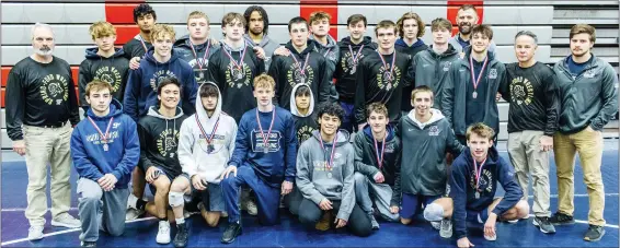  ?? NATE HECKENBERG­ER - FOR MEDIANEWS GROUP ?? Spring-Ford gathers with their second-place medals after a 36-22loss to Pennridge in the District 1-3A Duals.