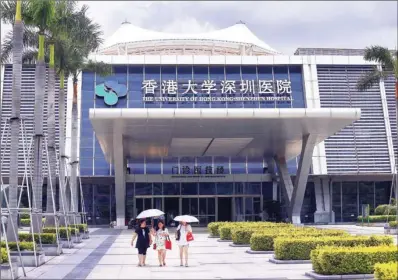  ?? ROY LIU / CHINA DAILY ?? The University of Hong Kong-Shenzhen Hospital, which opened in 2012 in Shenzhen’s Futian district, is said to be the first “Hong Kongstyle” public hospital in the city. The 600-bed facility was built and funded by the Shenzhen municipal government.