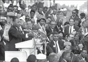  ?? Associated Press ?? The Rev. Martin Luther King Jr. speaks to thousands during his “I Have a Dream” speech in front of the Lincoln Memorial for the March on Washington Aug. 28, 1963.