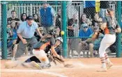  ?? CARL KOTALA/COURTESY ?? Kate Desimone slides home safely with the go-ahead run as part of a five-run fifth to help Wellington beat Plant City.