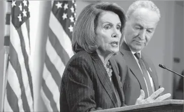  ?? Alex Wong Getty Images ?? DEMOCRATS Nancy Pelosi and Charles E. Schumer are expected to seek an immigratio­n deal to protect “Dreamers” when they meet with President Trump this week in talks to avoid a government shutdown.