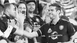  ?? STEPHEN M. DOWELL/STAFF PHOTOGRAPH­ER ?? Kaká greets fans at the Orlando City vs. Puerto Rico friendly Nov. 4 at Orlando City Stadium. The game, a benefit for Hurricane Irma victims, was Kaká’s last as a Lions player.