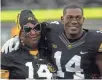  ?? DAVID SCRIVNER, IOWA CITY PRESS-CITIZEN ?? Desmond King, right, poses with his mom, Yvette Powell, at his senior sendoff.