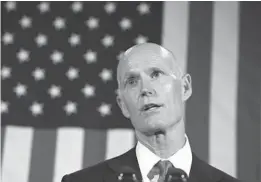  ?? ORLANDO SENTINEL FILE ?? Florida Gov. Rick Scott speaks at the Marriott Orlando Downtown during a campaign rally and luncheon for his Senate campaign in September. Vice President Mike Pence attended the event and campaigned for Scott.